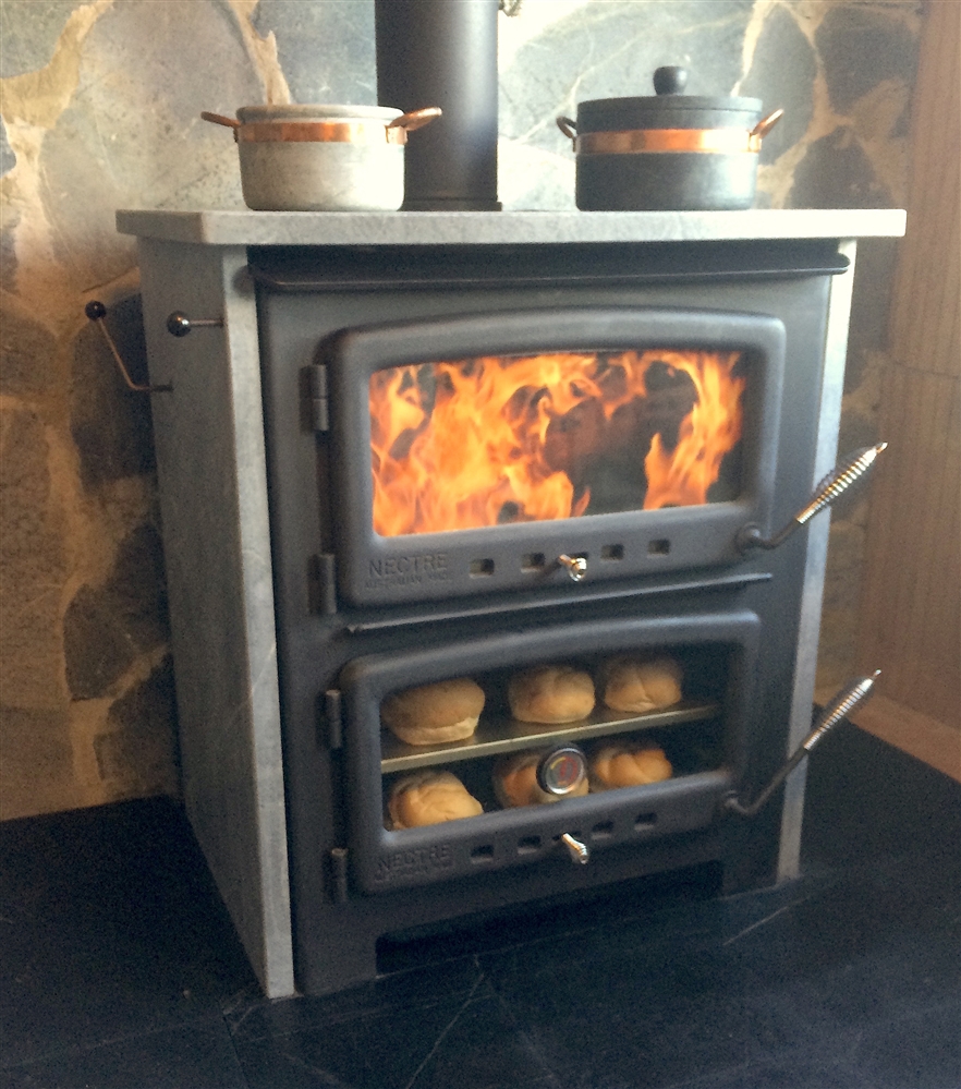 Cast iron wood stove with oven, wood burning stove, wood cook stove.